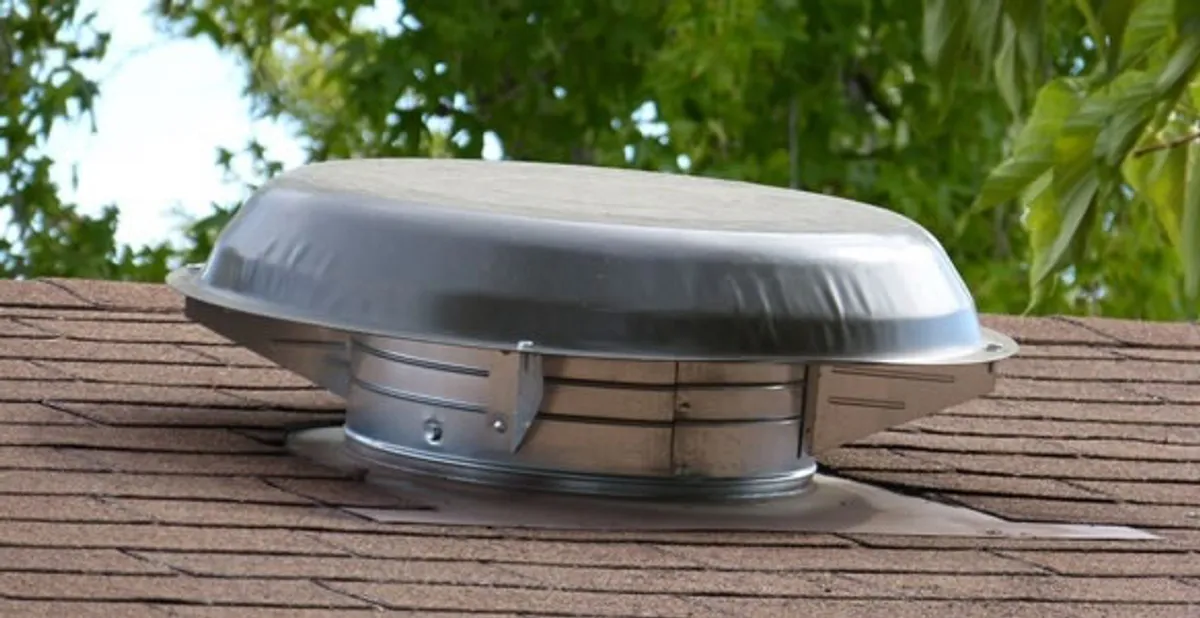 attic fan installation services with low-profile roof ventilation unit in Sacramento, CA