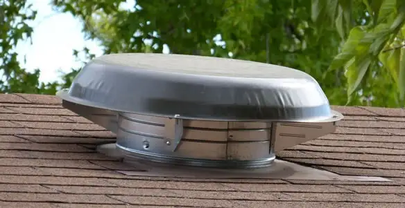 attic fan installation services with low-profile roof ventilation unit in Sacramento, CA