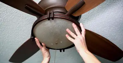 Ceiling fan repair and reinstallation on ceiling mount in Sacramento, CA