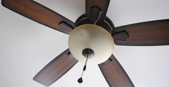 Fully installed ceiling fan with balanced blades and light fixture in Sacramento, CA
