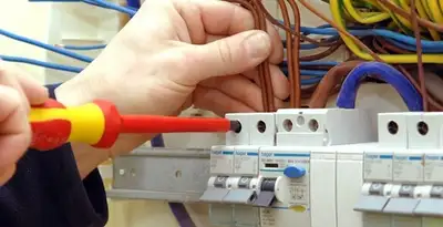 electrician services performing professional electrical panel wiring and connections in Sacramento, CA
