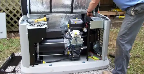 generator installation service showing technician connecting and configuring generator components in Sacramento, CA
