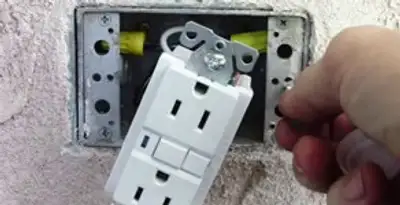 gfci circuits service showing installation of a ground fault circuit interrupter outlet by licensed electricians in Sacramento, CA