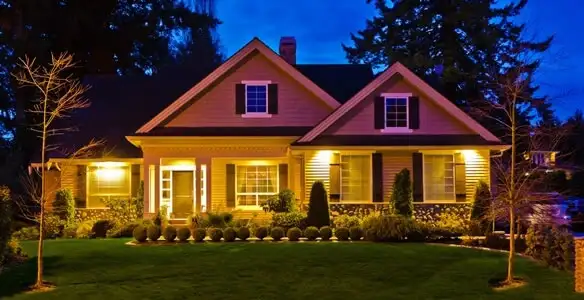 security light installation services illuminating a residential exterior at night in Sacramento, CA