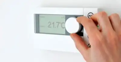 Thermostat installation service with professional adjusting temperature control in Sacramento, CA