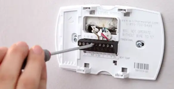 Thermostat installation service with proper wiring and secure wall mounting in Sacramento, CA
