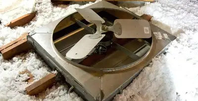 whole house fan installation services with attic-mounted ventilation unit in Sacramento, CA